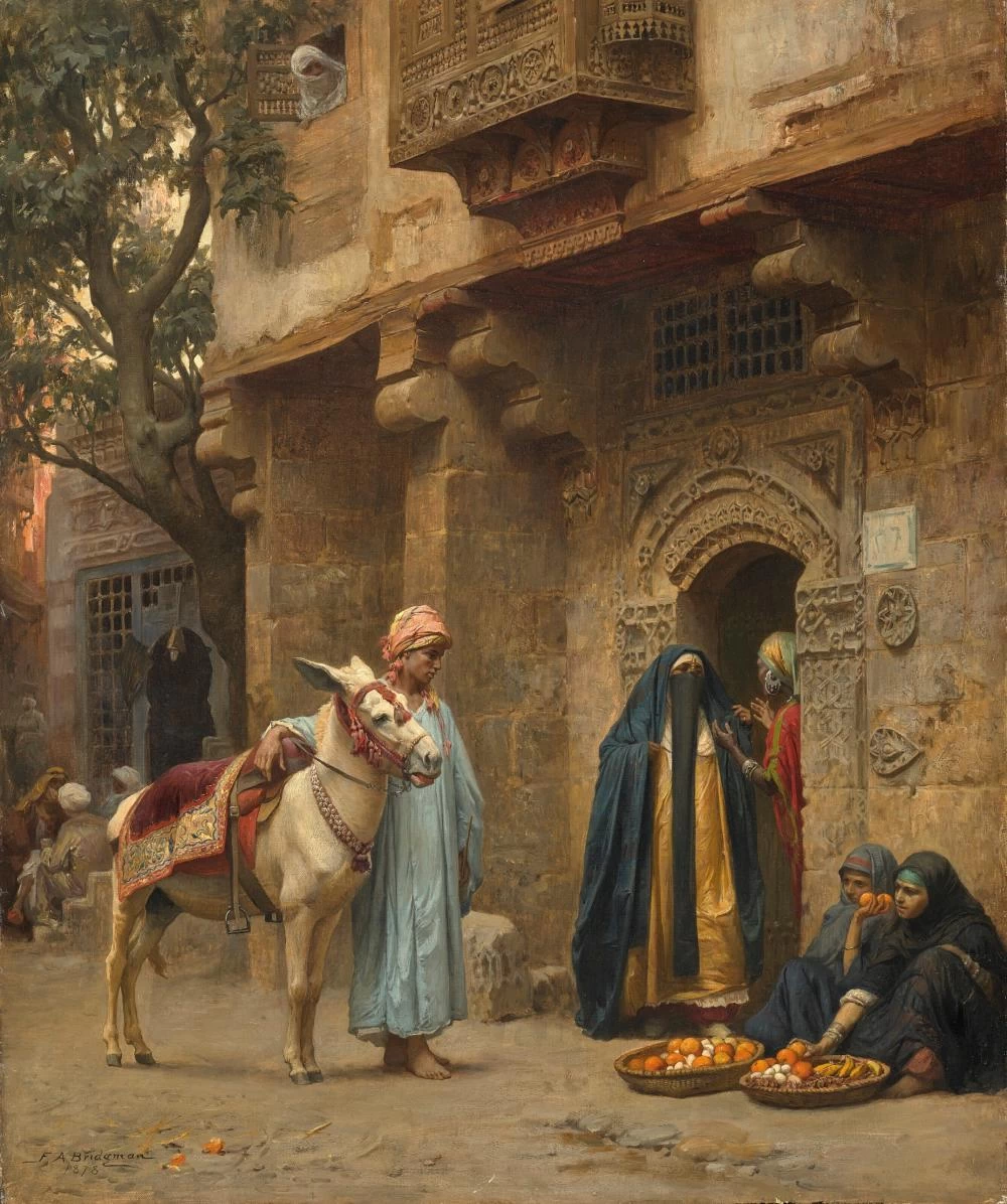 Donne arabe davanti a una porta